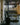 Complete home gym met dumbbells, halterstang, halterschijven, kettlebells, trainingsbank en power rack