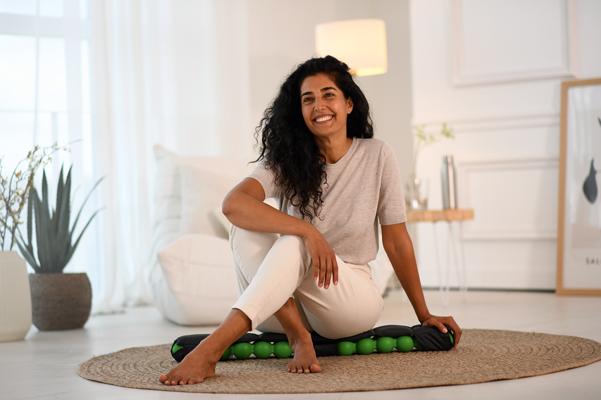 Spinefitter by SISSEL gebruikt tijdens Pilates mobiliteitsoefeningen