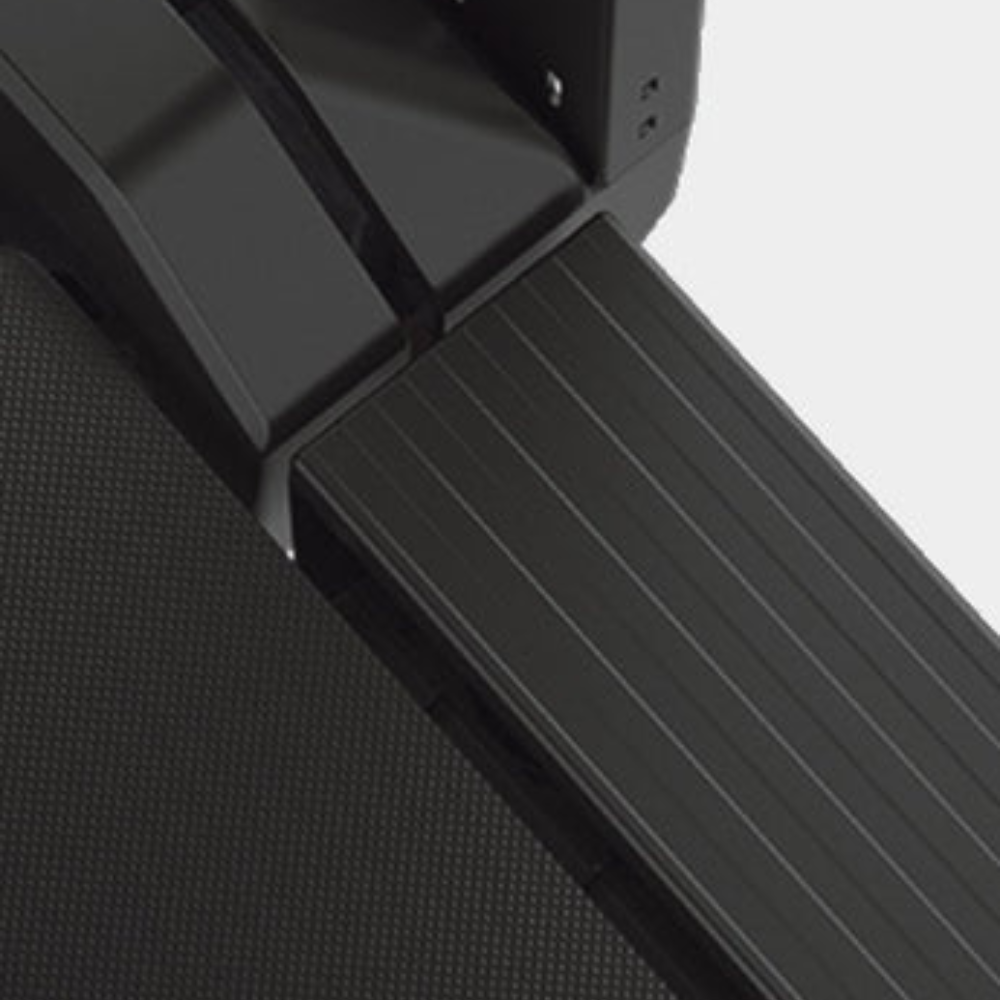 Compacte opvouwbare loopband met zijleuningen close up zijkant