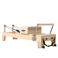 Professionele Pilates reformer met verhoogde carriage