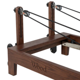 Complete wood reformer inclusief Pilates accessoires achterkant
