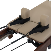 Luxe wood reformer voor thuisgebruik en Pilates studio straps